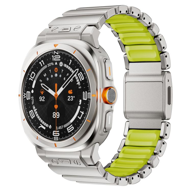 Silver smartwatch with a lime green silicone and stainless steel link band and magnetic clasp
