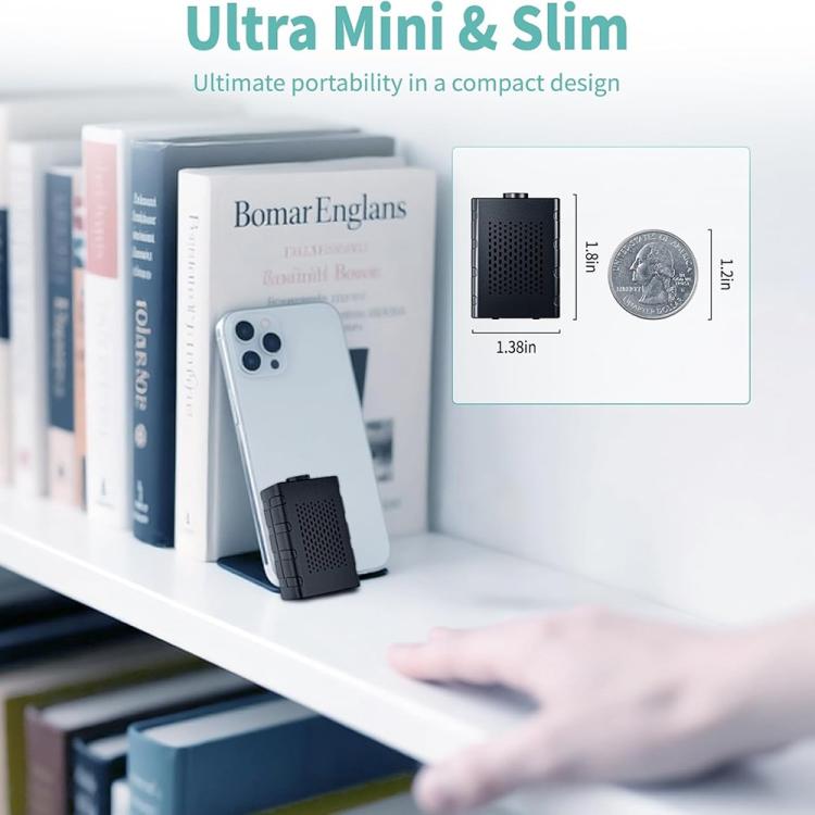 Ultra mini black WiFi night vision camera placed on a shelf next to books