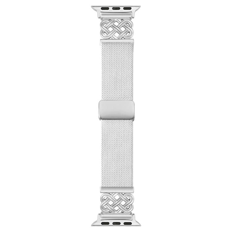 White stretch nylon Apple Watch band laid flat, with woven knots and magnetic buckle