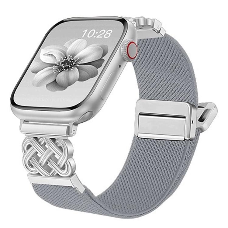 Apple Watch with a light gray woven stretch band, silver-tone Chinese knot connector and clasp