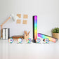 RGB desktop ambient light bars with remote on table setup, colorful light strips