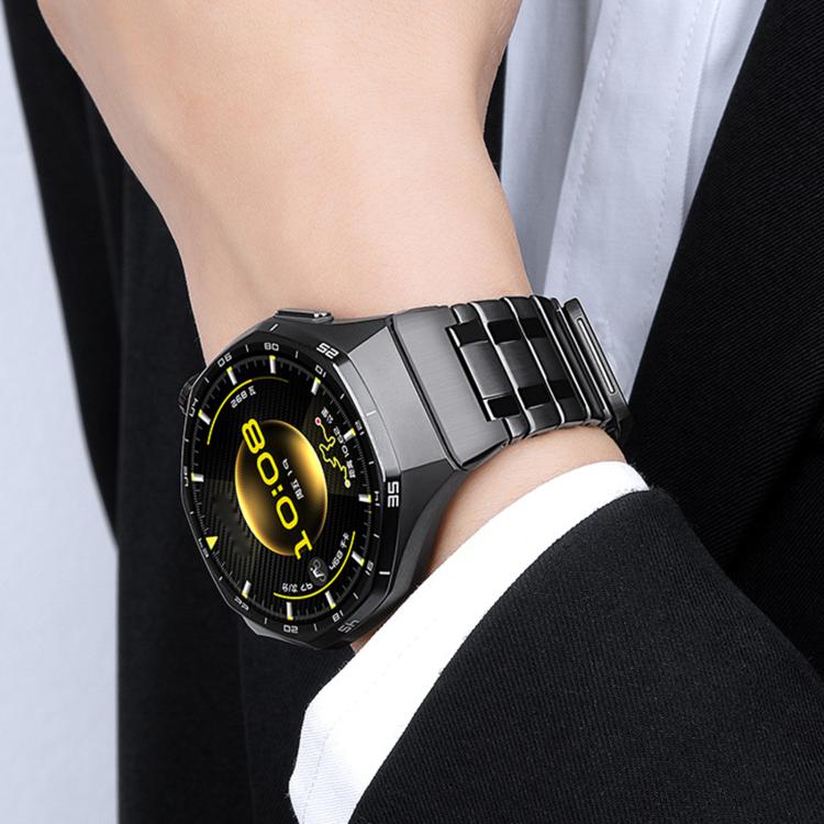 Black stainless steel link band fitted to a smartwatch on a wrist