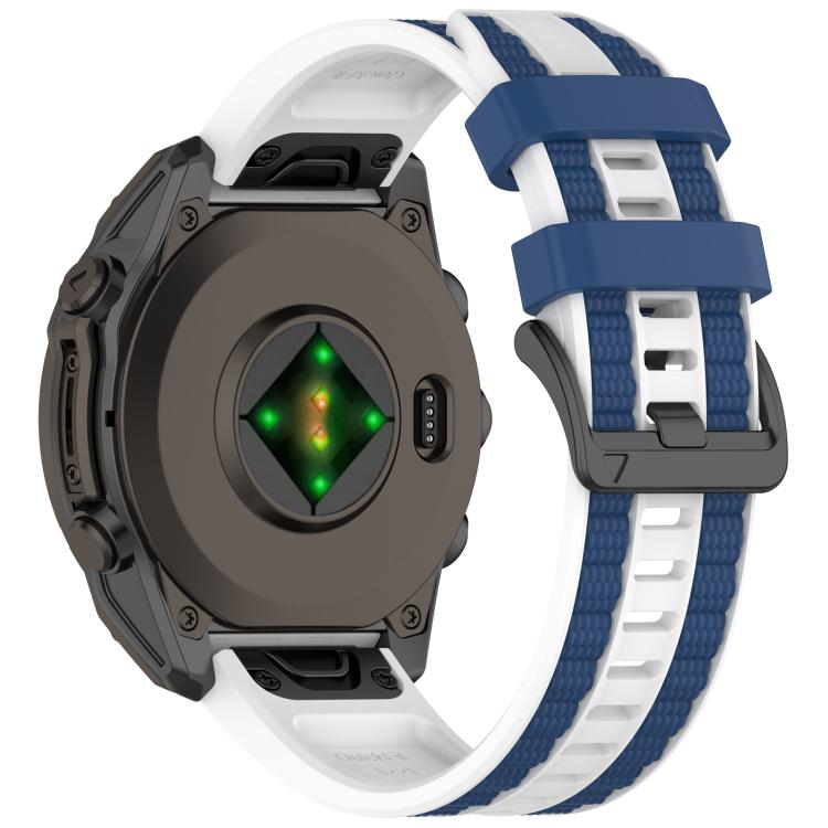 White and navy watch band shown from the underside with its buckle and Garmin watch back.