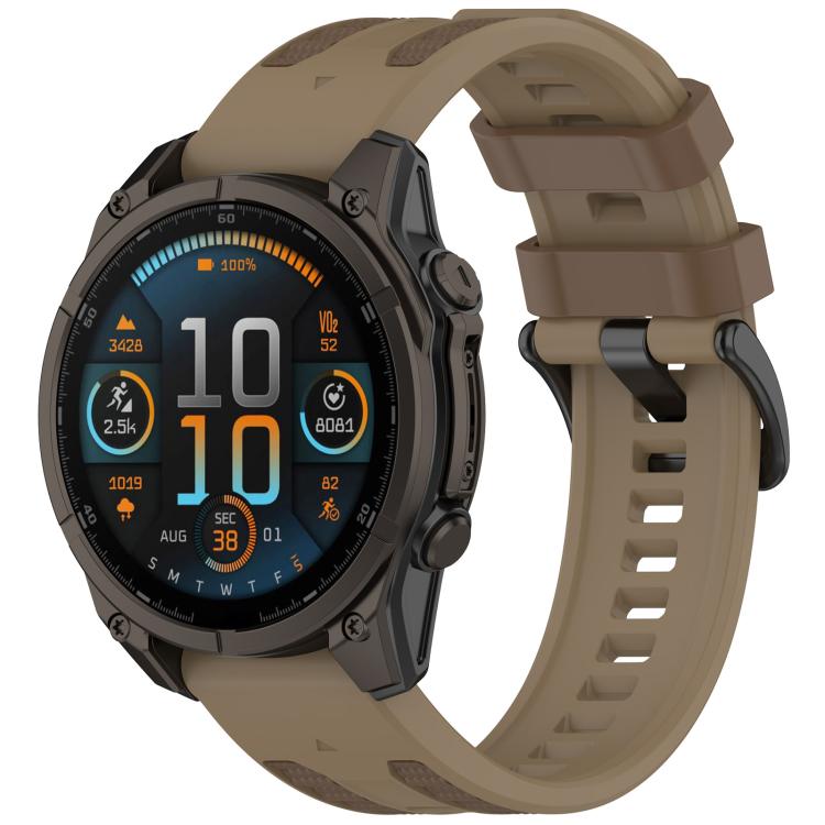 Khaki brown silicone watch band with matching loops on a Garmin watch.