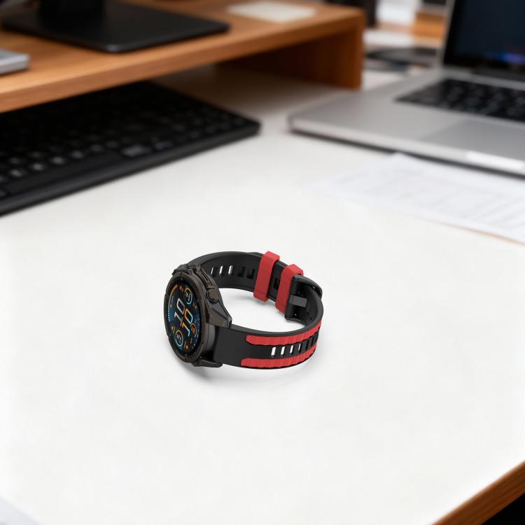 Black silicone watch band with red accents attached to a smartwatch, shown from the front.