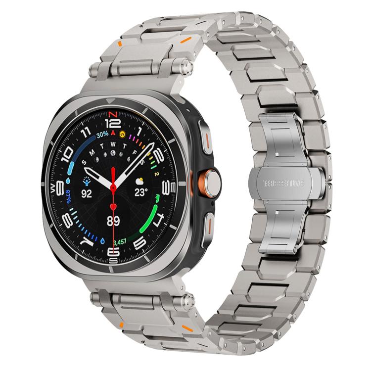 Silver titanium alloy watch band with butterfly clasp, shown on a round smartwatch