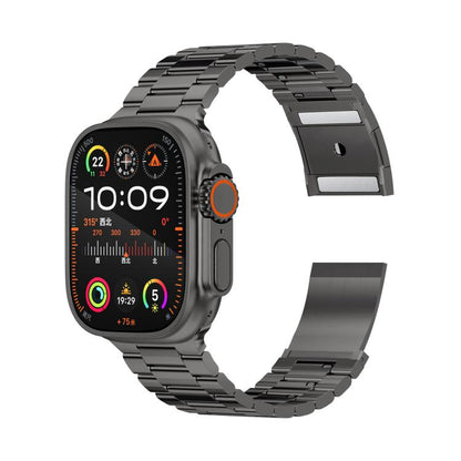 Dark metal watch band and smartwatch, showing the linked bracelet and clasp
