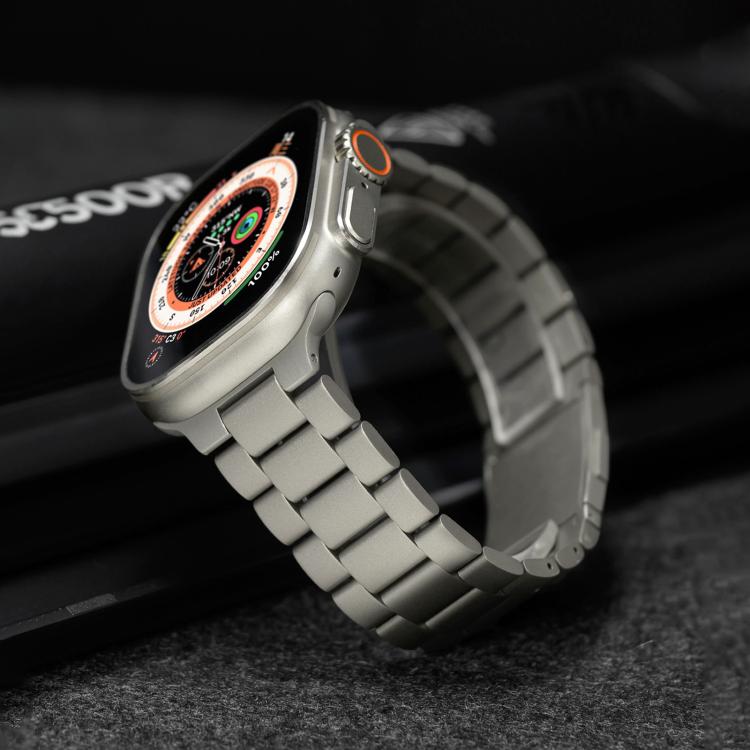 Titanium three-bead metal band fitted to a smartwatch