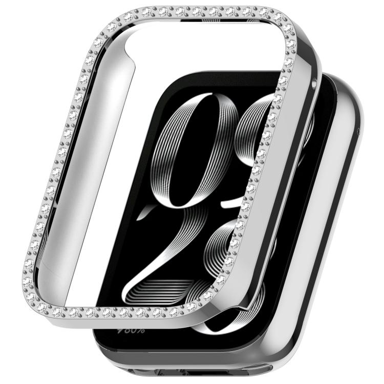 Silver rhinestone watch case shown over a smartwatch screen