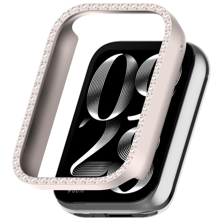 Rose gold half-coverage watch case with crystal trim shown over a smartwatch