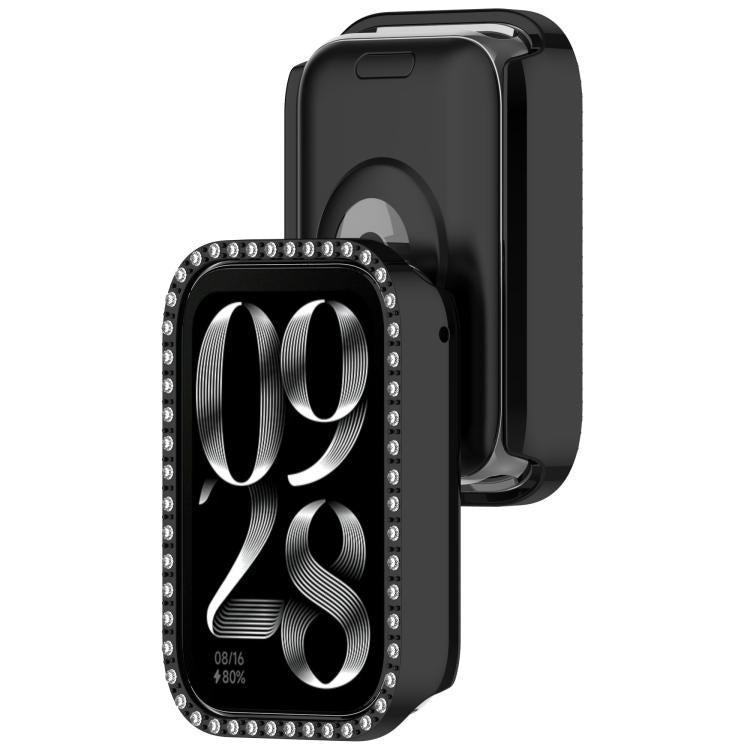 Black rhinestone watch case shown beside its rear cover