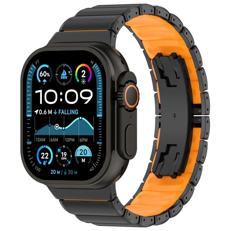 Black titanium alloy watch band with orange silicone lining and folding clasp, shown on a watch