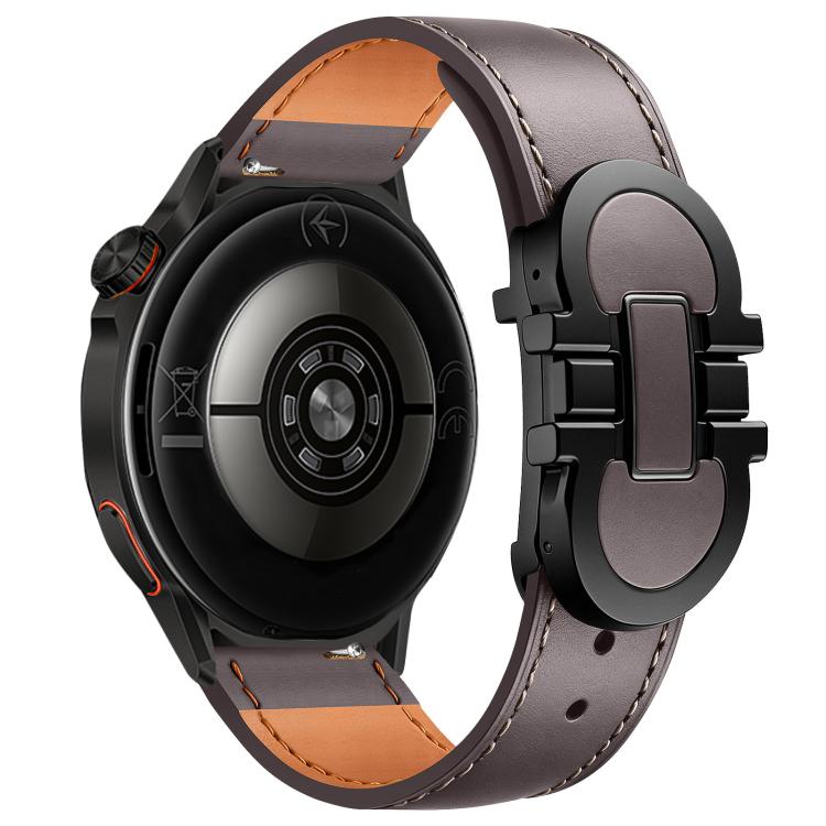 Taupe leather watch band with a black magnetic buckle and tan inner lining