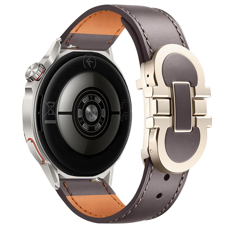 Taupe leather watch band with pale metal magnetic buckle, shown on a smartwatch