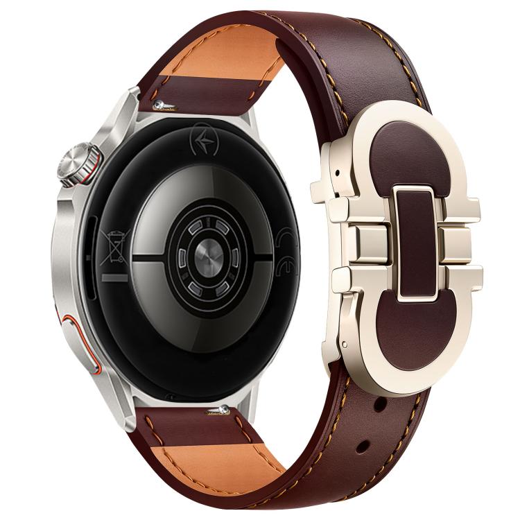 Dark brown leather watch band with pale metal magnetic buckle, shown on a smartwatch