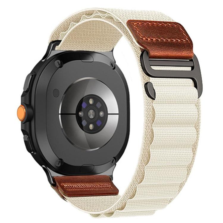 Alpine nylon loop watch band in cream with brown vegan leather tabs and dark metal hardware
