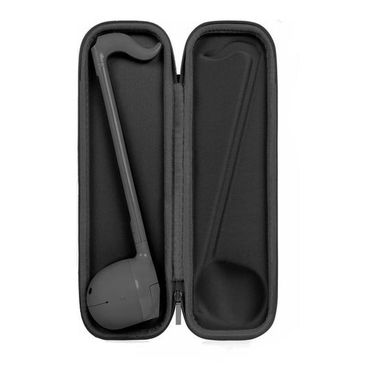 Black portable hard case with molded interior compartments and zipper