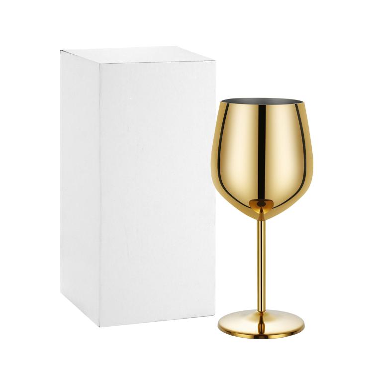 Gold metal stemmed champagne wine glass, reflective bowl with slender stem and base