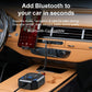 Black Bluetooth audio transceiver plugged into car dashboard, NFC icon visible