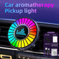 Car air vent aroma diffuser light with colorful LED ring; mounted in dashboard vent.