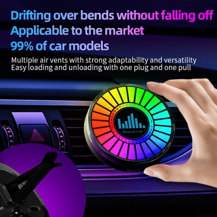 Car air vent RGB aroma diffuser light with multicolor LED ring and hand placement.