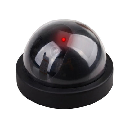 Black dome security camera with clear lens and red LED indicator