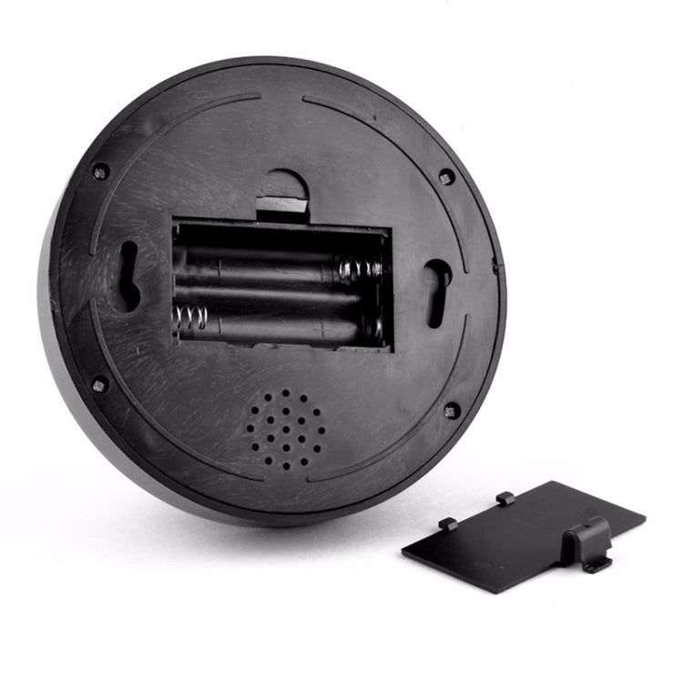 Black dome security camera base with open battery/insides panel