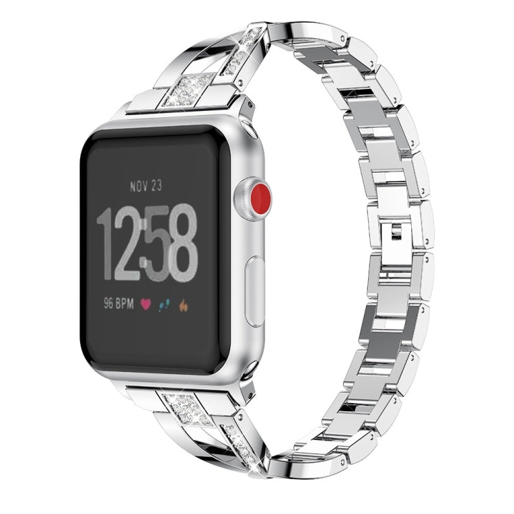 Smartwatch with silver X-shaped metal link strap and red side button detail