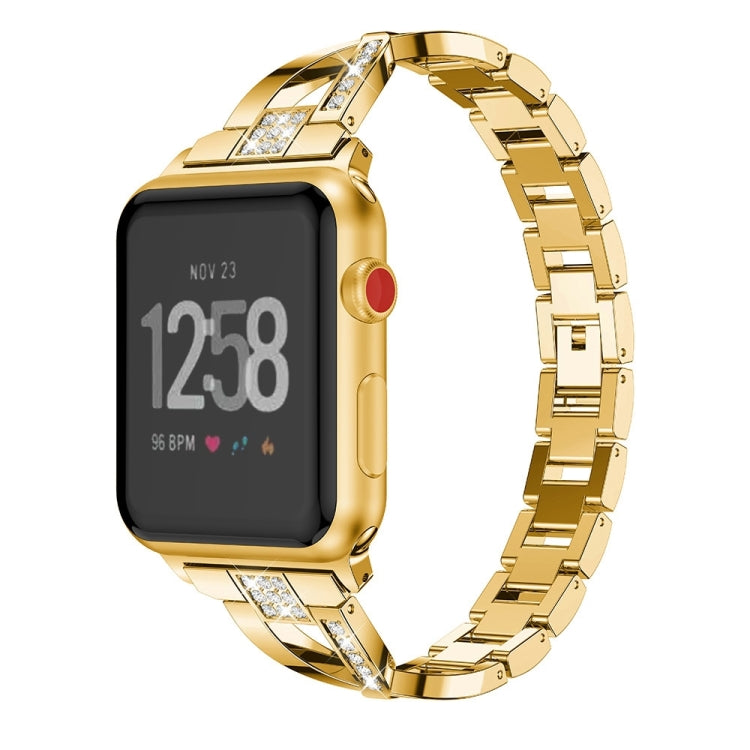 Smartwatch with gold X-shaped metal link strap and red side button detail