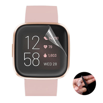 Full-coverage TPU screen protector film for Fitbit smartwatch on pink band watch face