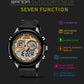 Digital wristwatch with black case, gold dial, three subdials, black strap