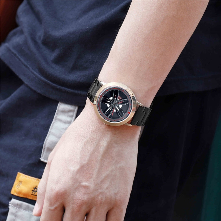 Men's wristwatch with dark band and racing-wheel dial, worn on a hand.