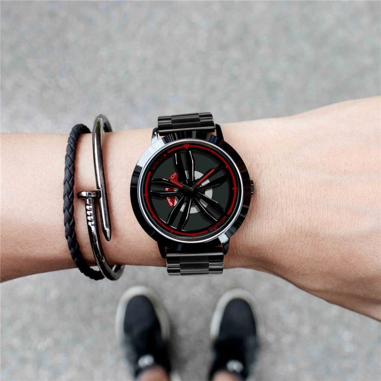Men's watch on wrist with black dial, red markers, and metal bracelet.
