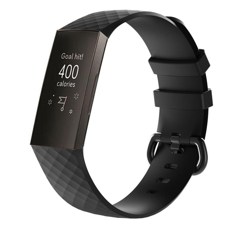 Black diamond-pattern silicone Fitbit Charge 3 wrist strap, buckle detail and strap holes