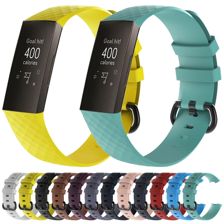 Assorted color diamond-pattern silicone Fitbit wrist straps with buckles and adjustable holes