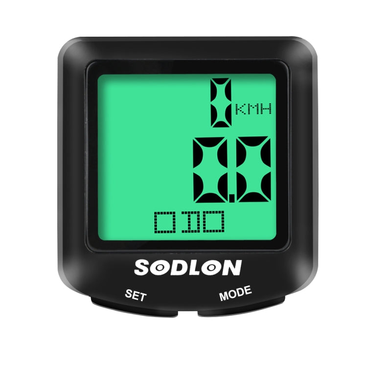 Wired bicycle computer front view with green LCD showing speed and distance icons
