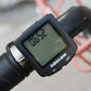 Wired waterproof bicycle computer with green LCD mounted on handlebars, SDLON branding
