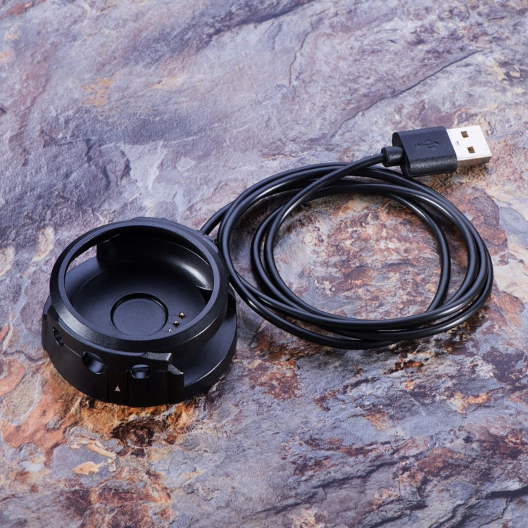 Black charging base with coiled USB data cable and USB connector
