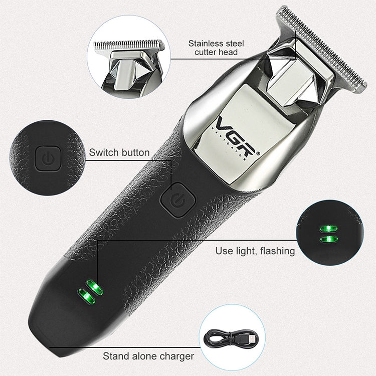 Electric hair trimmer with stainless cutter head, power button, and charging base