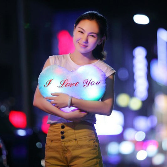 Light-up heart plush pillow with red “I love you” and blue glow
