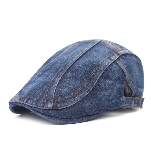 Washed denim beret with contrast stitching and curved brim, adjustable back strap