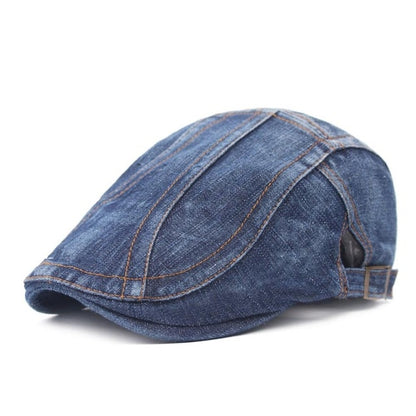 Washed denim beret with contrast stitching and curved brim, adjustable back strap