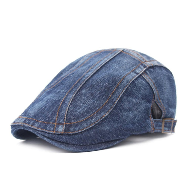 Washed denim beret with panel seams and curved brim, adjustable back strap