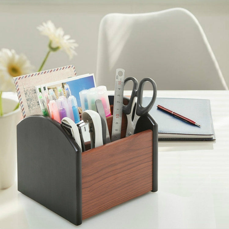 Wooden pen holder box with four compartments and dark gray side panels, open front.