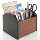 Wooden desk pen organizer with four compartments, dark gray side panels, holds stationery.