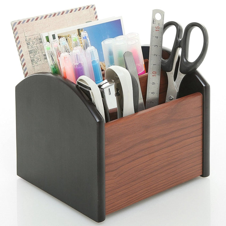 Wooden desk pen organizer with four compartments, dark gray side panels, holds stationery.