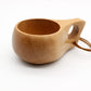 Handmade wooden cup with open bowl and side oval cutout with cord ties