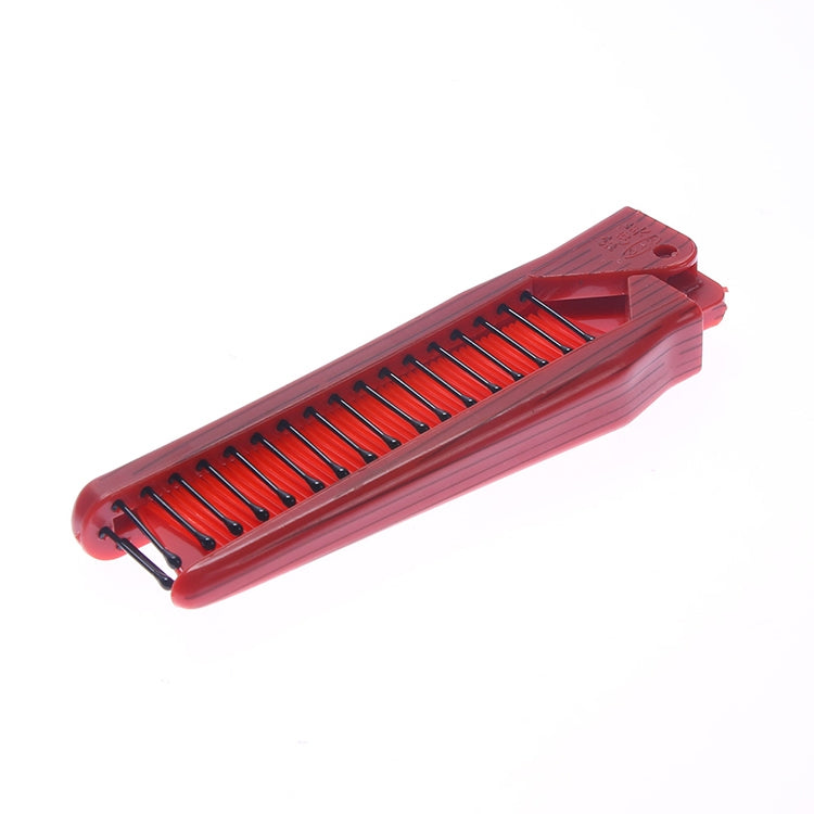Red folding hair comb with fine comb teeth and rounded massage pins