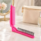 Pink folding travel hair comb with fine teeth and massage pins