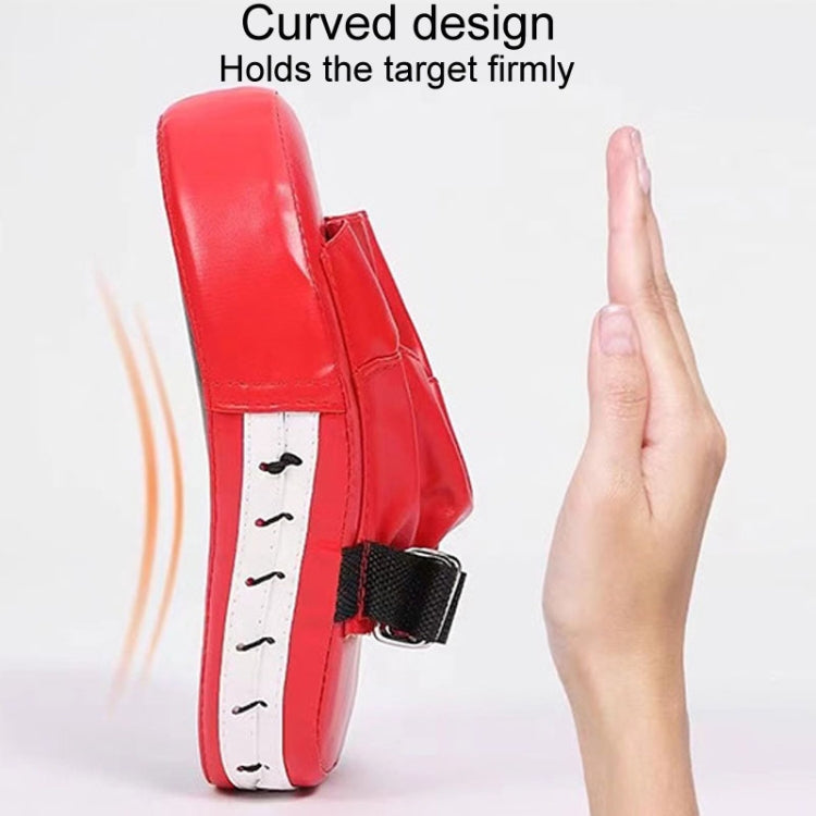 Red curved hand target with wrist strap, held against an open hand